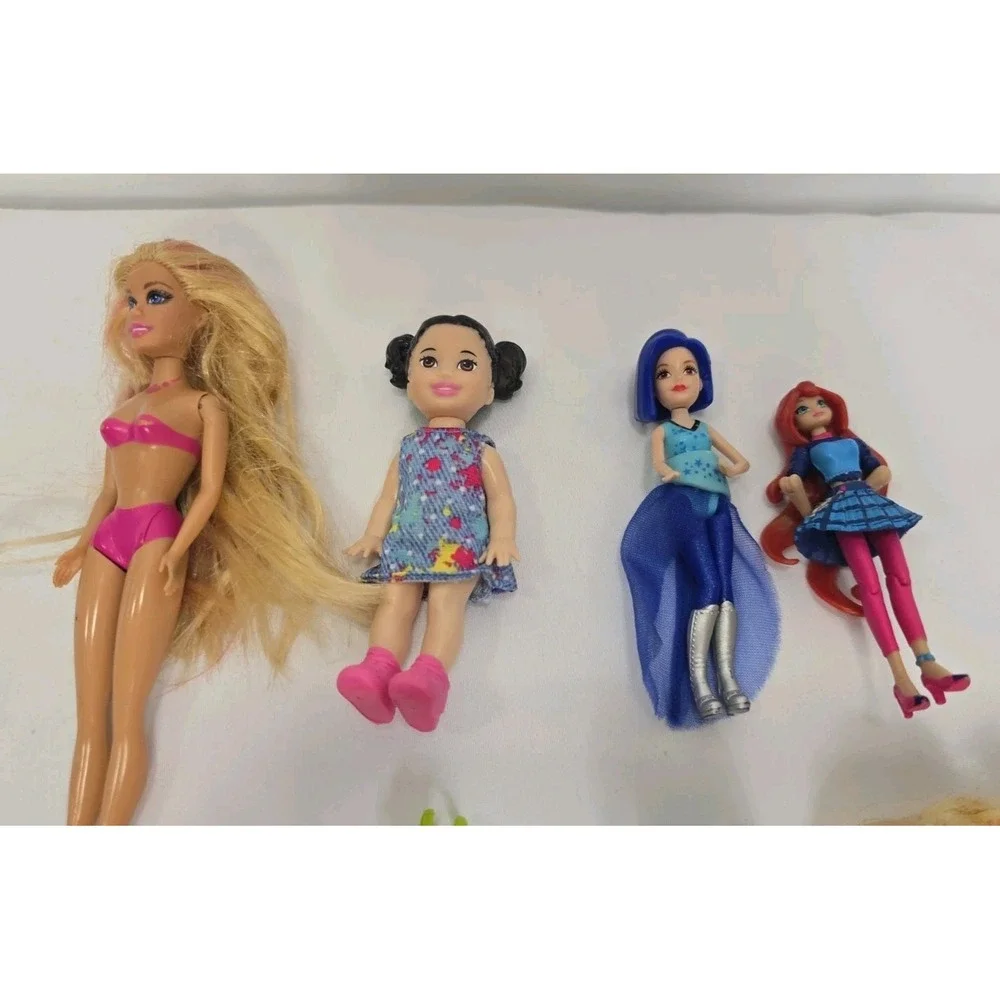 13 Piece Lot Of Small Toy Dolls And Accessories